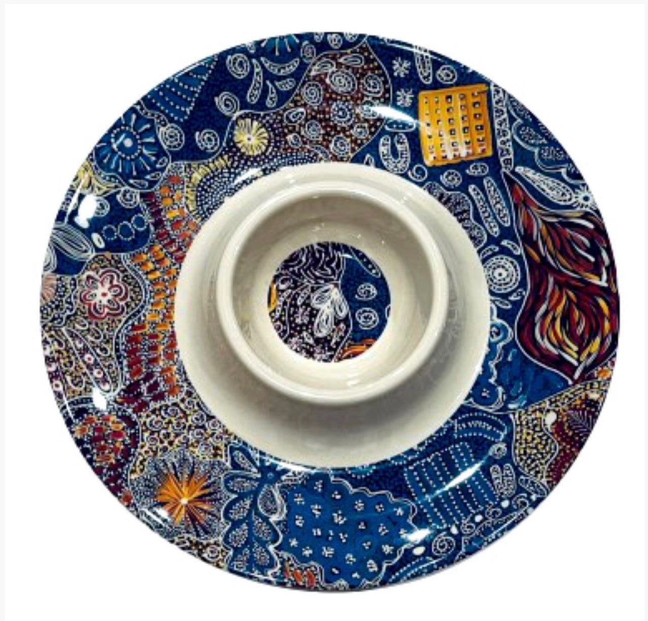 Serving tray in Indigenous design artwork.
